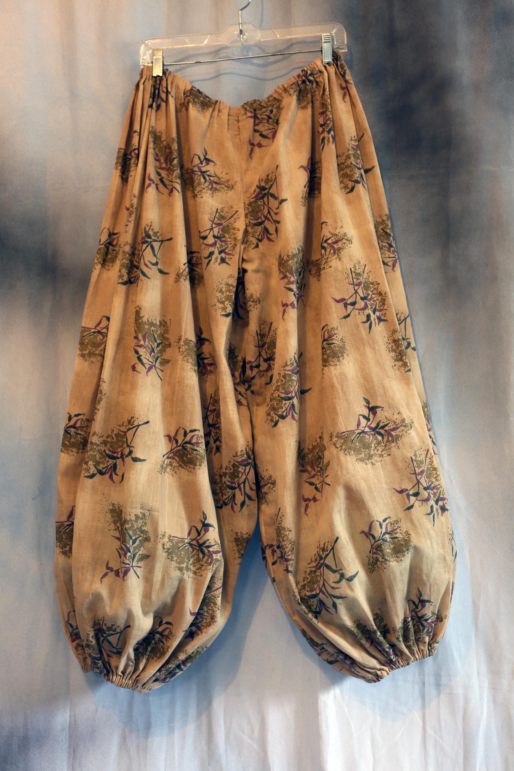 3 yards of soft brown woven fabric harem pants. The print is  a widely scattered brown leaf motif.